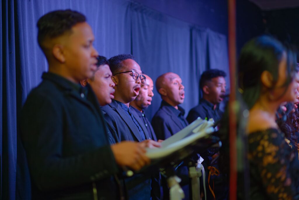 The choir's men singing